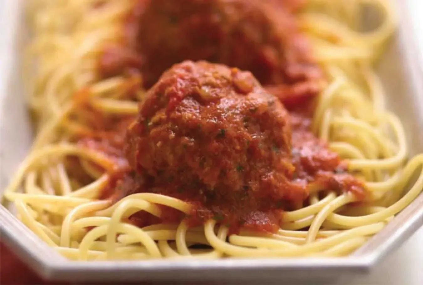 Serving and Enjoying Your Grandma's Spaghetti and Meatballs