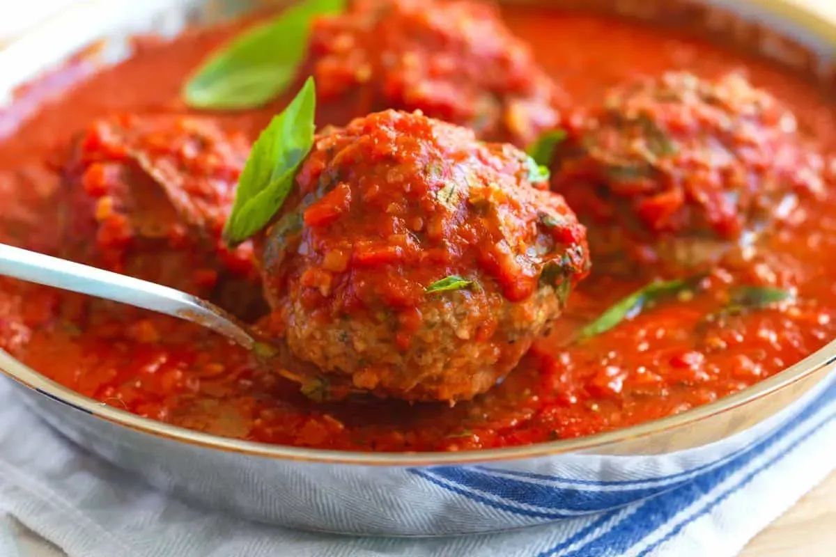 Serving Your Authentic Italian Sauce and Meatballs Feast